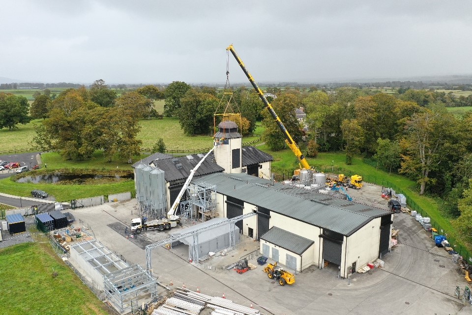 Overhead picture of the roof coming off of Royal Oak Distillery still tower roof lift